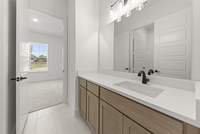 bathroom with vanity and tile patterned floors