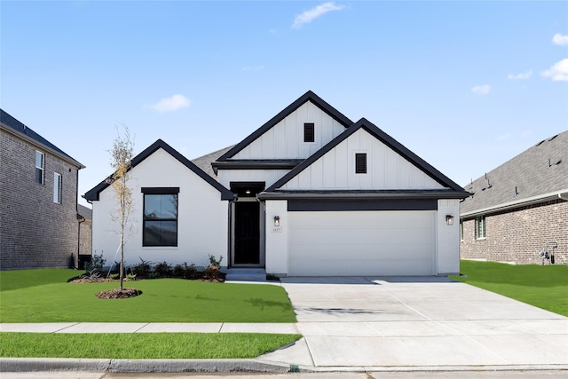 modern farmhouse with a garage and a front yard