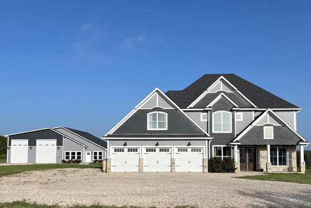 craftsman-style home featuring a front yard