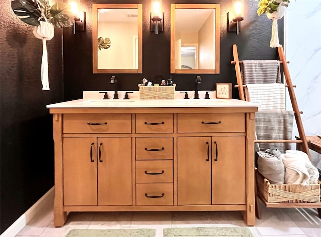 bathroom featuring vanity and tile patterned flooring