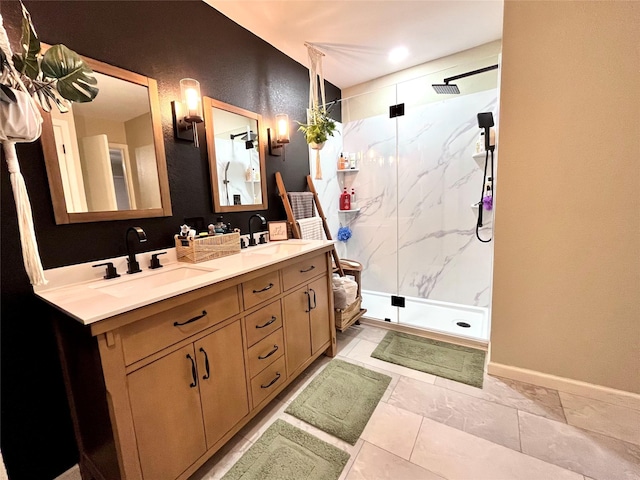 bathroom with vanity and a shower with shower door