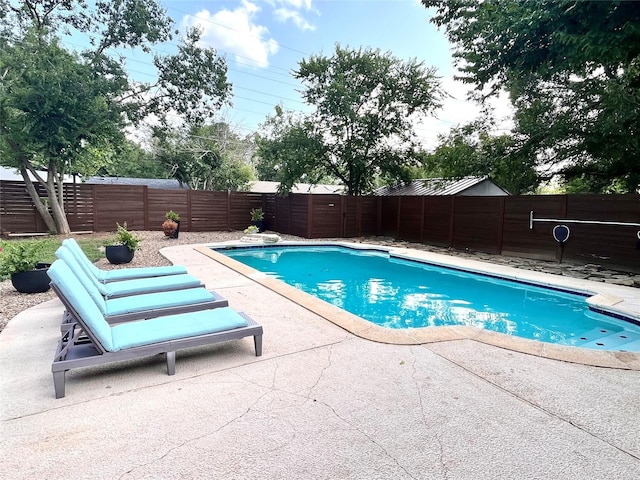 view of pool with a patio