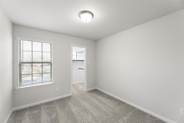 empty room featuring carpet floors