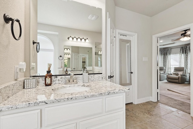 bathroom with vanity and ceiling fan