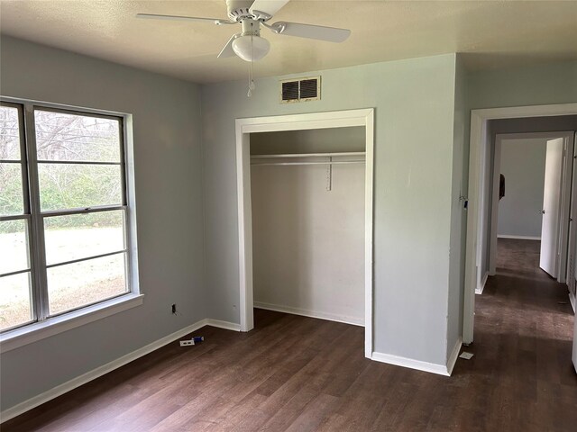 empty room with hardwood / wood-style flooring