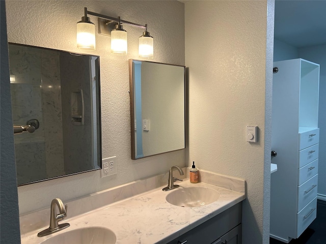 334 Fort Graham Rd, Whitney, TX 76692 - full bathroom with a textured wall and double vanity