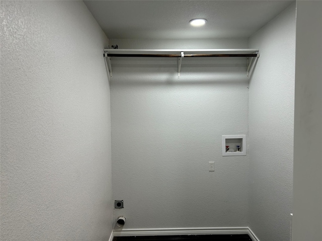 334 Fort Graham Rd, Whitney, TX 76692 - clothes washing area featuring hookup for a washing machine, baseboards, and hookup for an electric dryer