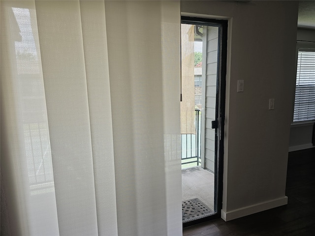 interior space with dark hardwood / wood-style floors