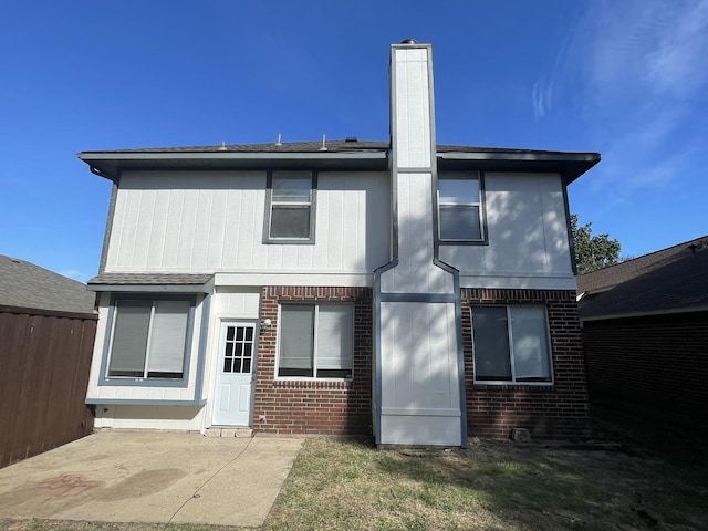 rear view of property with a patio area