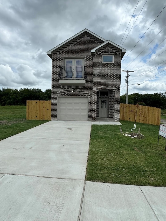 view of property with a garage, a balcony, and a front lawn