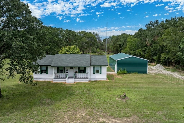 ranch-style home featuring a porch and a front yard