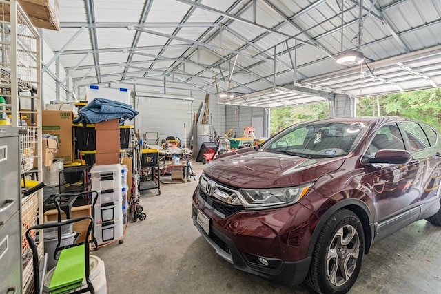 garage with metal wall and a garage door opener