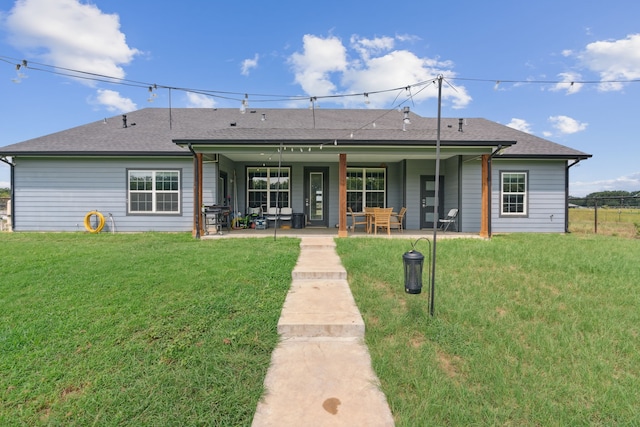 exterior space featuring a patio and a front yard