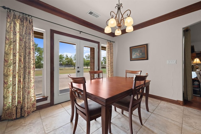 dining room featuring french doors, light tile patterned floors, visible vents, ornamental molding, and baseboards