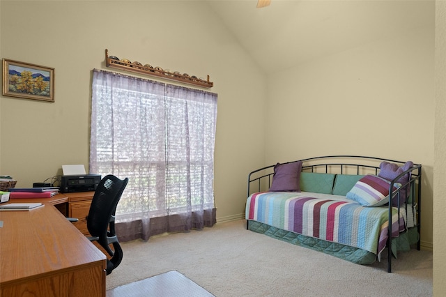 bedroom with carpet flooring and vaulted ceiling