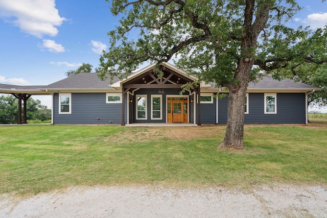 view of front of property with french doors and a front yard