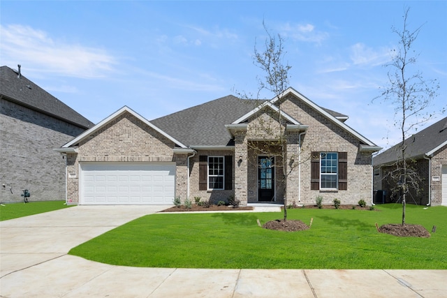 craftsman house with a front yard, central air condition unit, and a garage