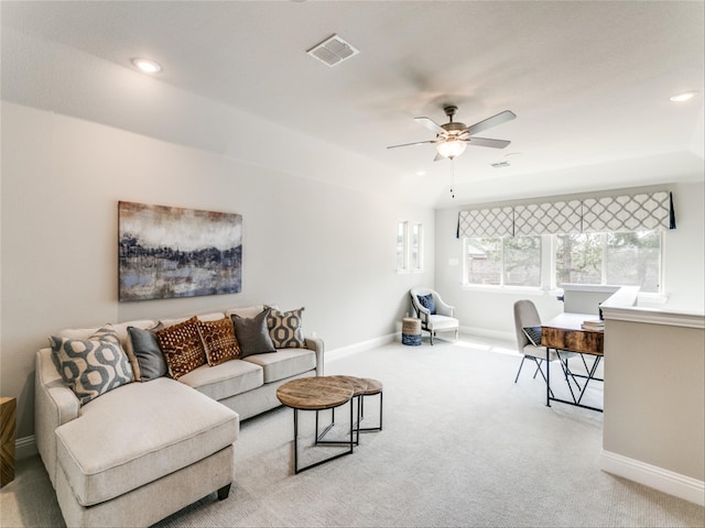 living room with ceiling fan and light carpet