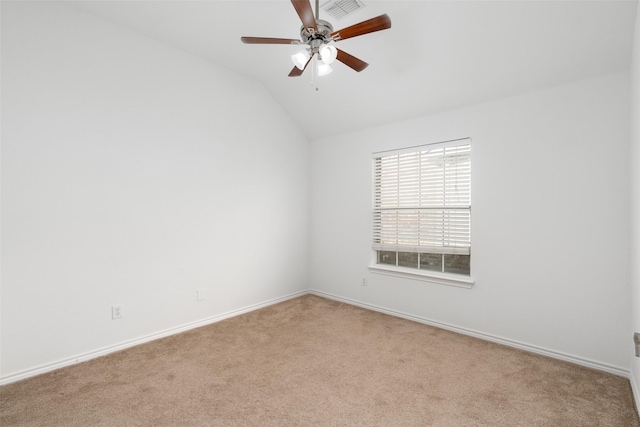 unfurnished room featuring lofted ceiling, ceiling fan, and light colored carpet