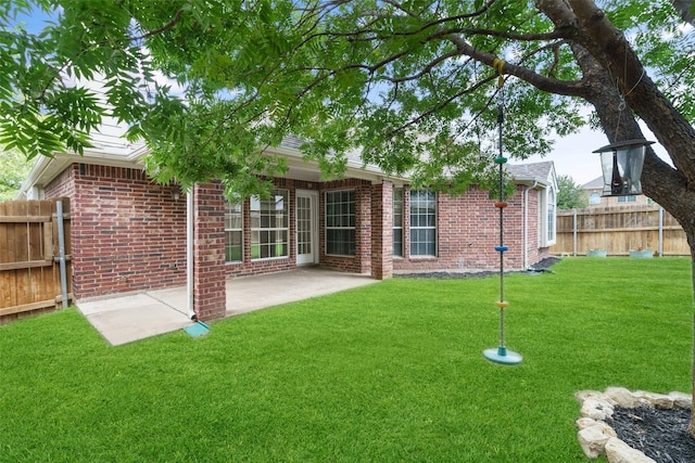 back of house featuring a patio