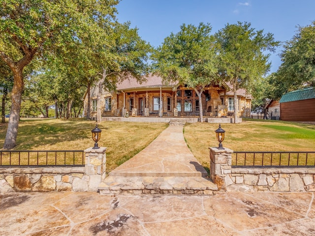 view of front of home with a front yard