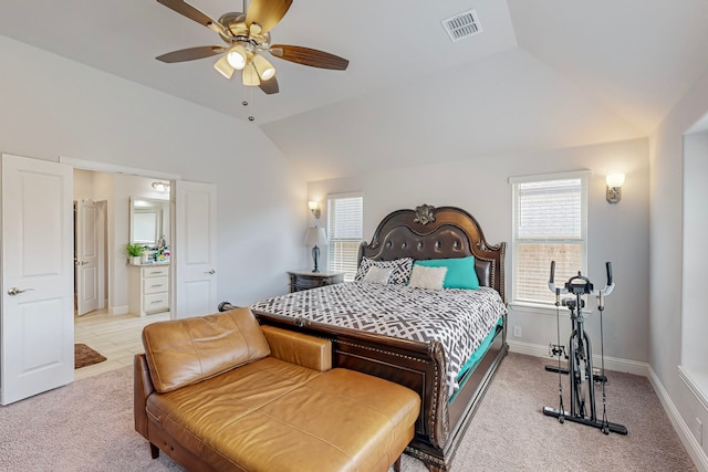 bedroom with light carpet, lofted ceiling, and ceiling fan