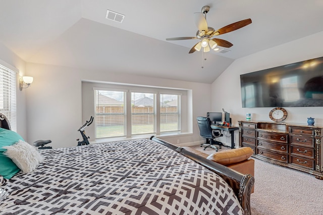 bedroom with carpet floors, lofted ceiling, and ceiling fan