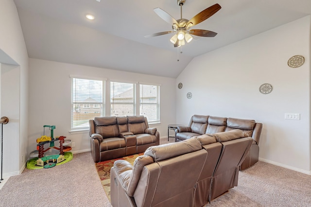 living room featuring light carpet, ceiling fan, and vaulted ceiling