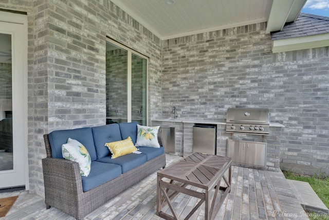 view of patio / terrace featuring an outdoor hangout area and area for grilling