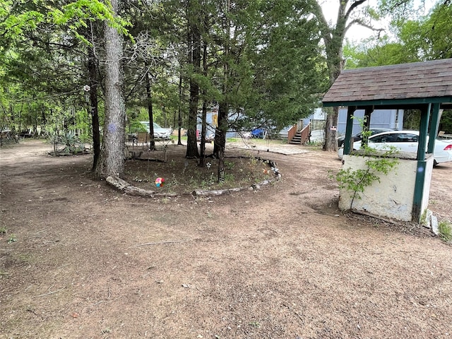 view of yard with a carport