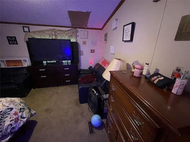 bedroom with a textured ceiling, lofted ceiling, and light colored carpet