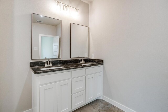 bathroom featuring vanity and walk in shower