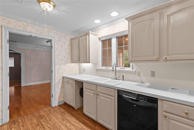 kitchen with crown molding, sink, light wood-type flooring, and black dishwasher