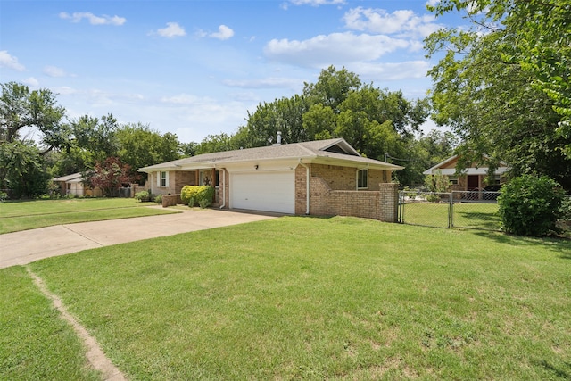 exterior space featuring a garage and a lawn