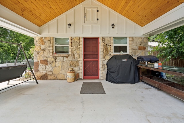 entrance to property featuring a patio area