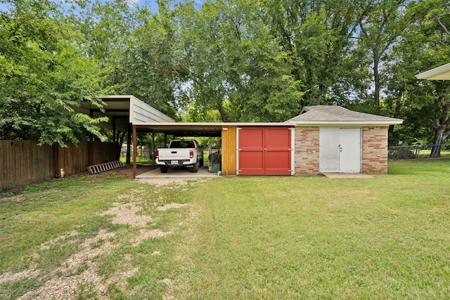 view of outdoor structure with a yard