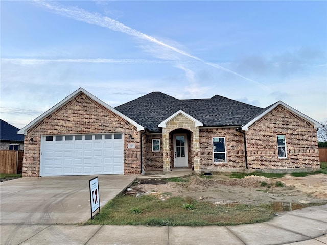 view of front of property featuring a garage