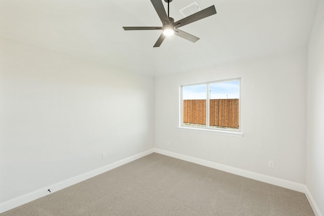 carpeted empty room with ceiling fan