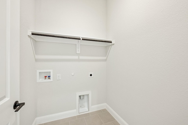 laundry room with electric dryer hookup, hookup for a gas dryer, hookup for a washing machine, and light tile patterned flooring