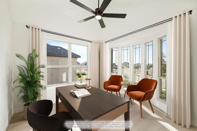 office space featuring light wood-type flooring and ceiling fan