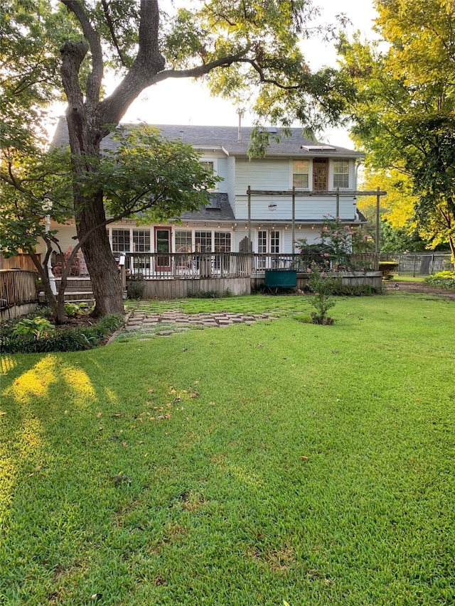 view of yard featuring a deck