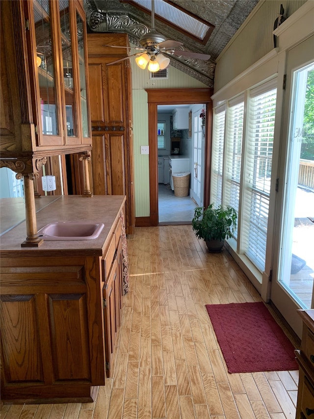 kitchen featuring lofted ceiling and ceiling fan