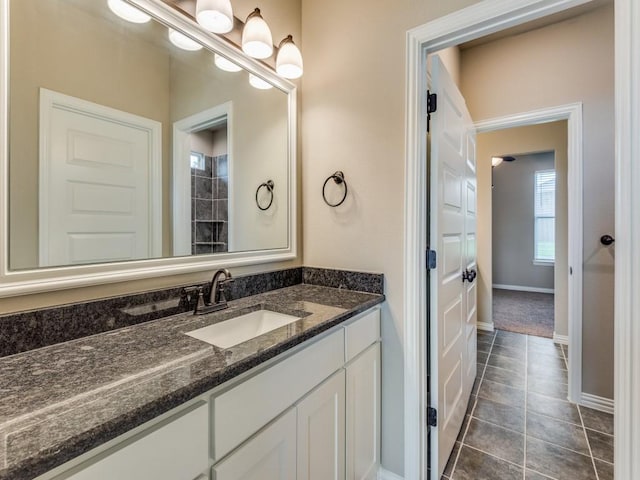 bathroom featuring tile patterned floors and vanity