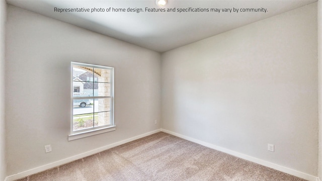 view of carpeted spare room