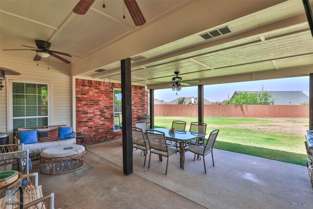 view of patio with ceiling fan and an outdoor hangout area