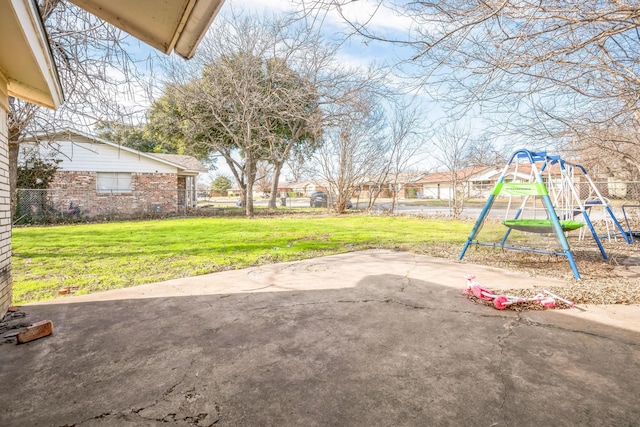 view of patio featuring a playground