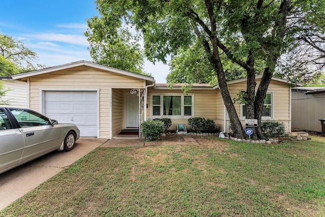 ranch-style home featuring a garage and a front yard