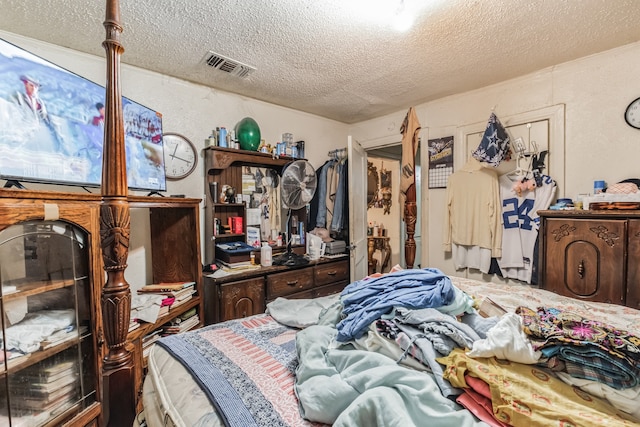 bedroom with a textured ceiling