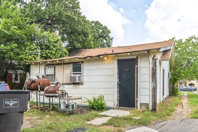 exterior space featuring cooling unit