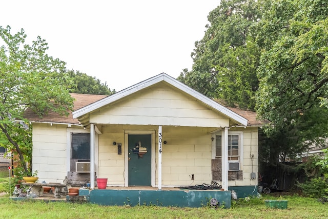 view of front facade with cooling unit